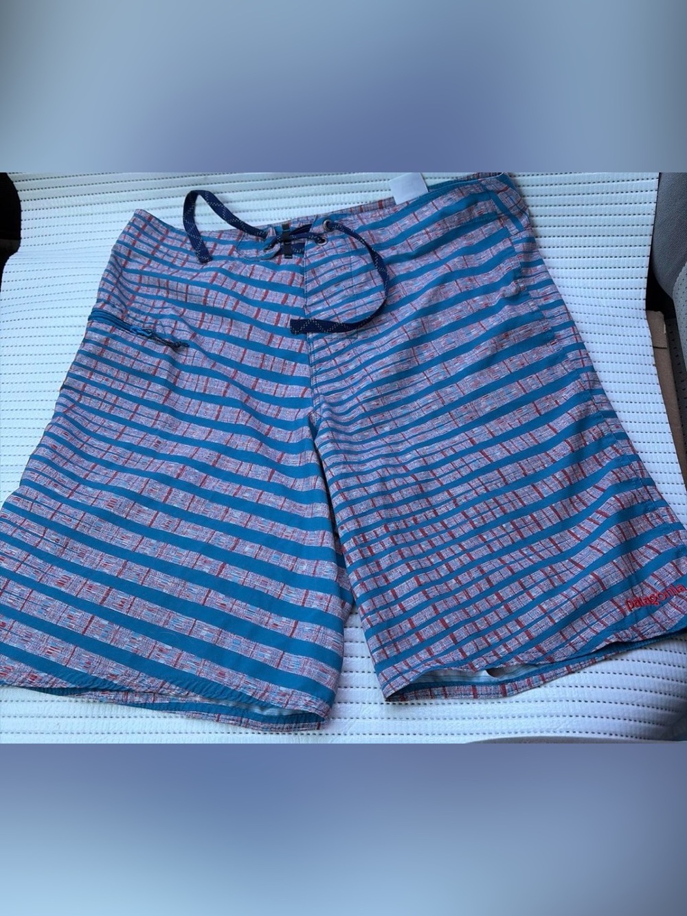 Patagonia Blue and Red Striped Board Shorts